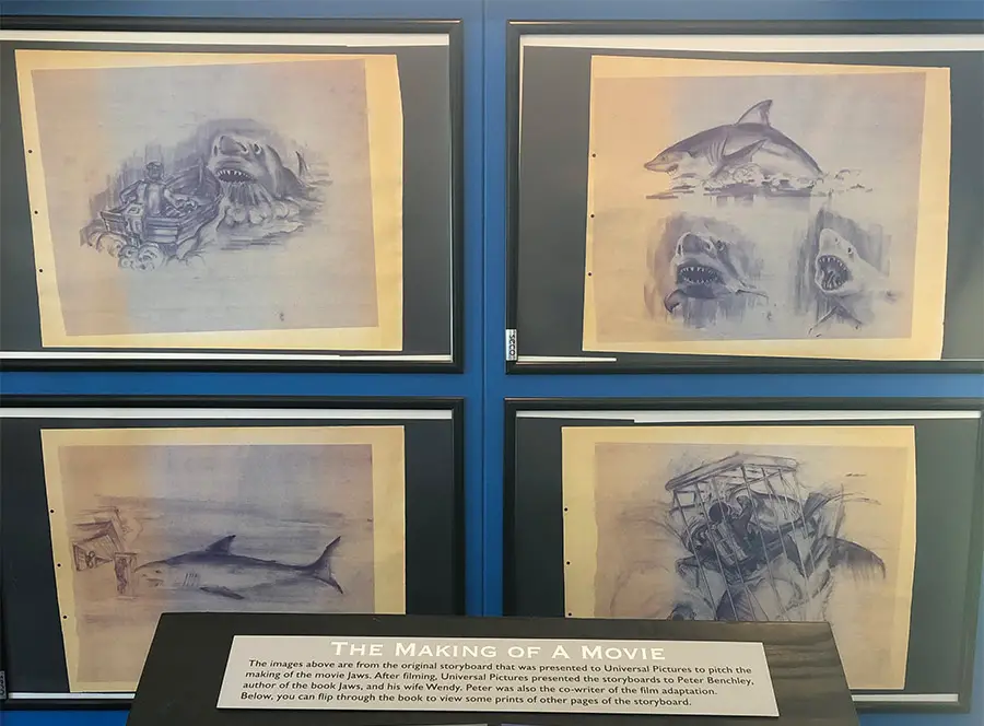 Framed storyboard sketches from JAWS on display at the Chatham Shark Center. 